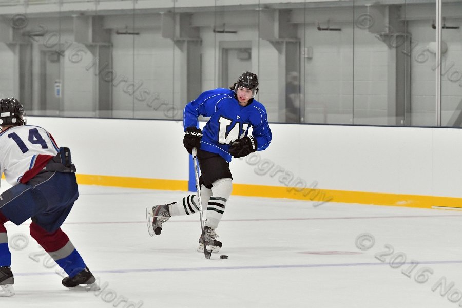 Wheaton College Men\'s Ice Hockey vs Middlesex Community College. - Photo By: KEITH NORDSTROM